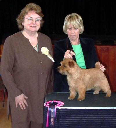 BEST IN SHOW & BEST BITCH KRISMA JELLYBEAN with judge Annette Penny  and owner Dot Britten